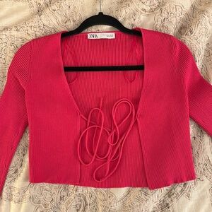Hot pink full sleeve crop top front tie. Worn only once. Selling due to size :)